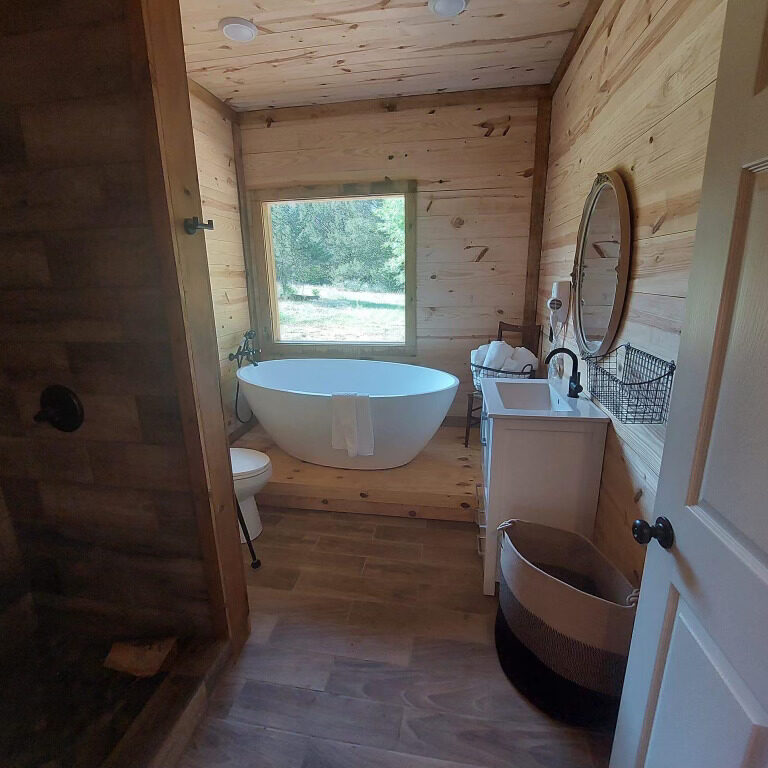 Cabin restroom with pedestal tub